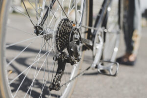 Home - bicycle s detail view rear wheel with chain sprocket scaled