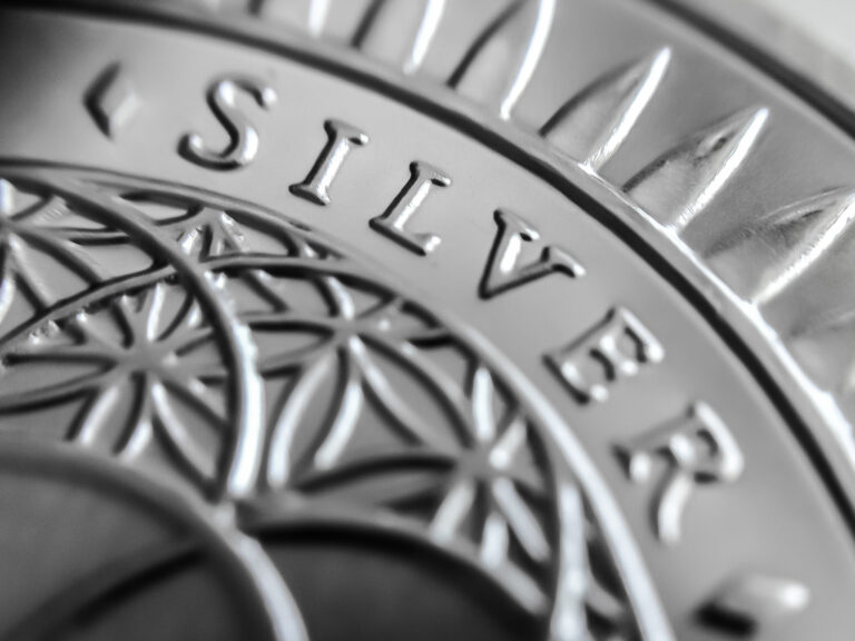 News - closeup grayscale of a coin with silver writing 2023 11 27 05 31 12 utc scaled