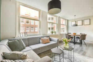Home - spacious attic room with sofa kitchen scaled