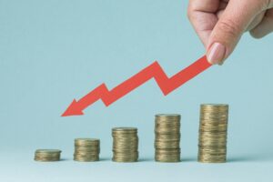 Home - stapel von munzen die eine grafik bilden scaled