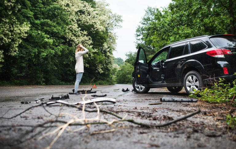 News - young woman standing by the damaged car after a ca 2024 10 18 09 52 52 utc scaled
